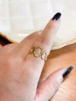 Anel de Aço Círculos Dourados - Imagem 2