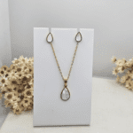 Conjunto Gota Madrepérola em Aço Dourado