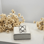 Anel Trançado Vazado em Aço