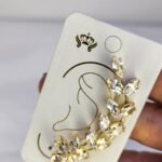EARCUFF PEDRAS FLORES BIJU DOURADO